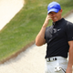 Rory McIlroy reacts after missing a putt on the 13th green during the first round of the Masters at Augusta National Golf Club.